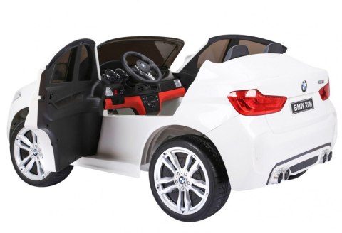 BMW X6M XXL dla 2 dzieci Biały + Pilot + Ekoskóra + Pasy + Wolny Start + MP3 USB + LED BMW X6M XXL dla 2 dzieci Biały + Pilot + Ekoskóra + Pasy + Wolny Start + MP3 USB + LED