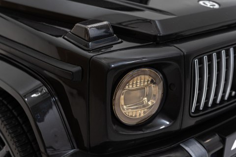 Mercedes AMG G63 dla dzieci Czarny + Pilot + MP3 LED + Wolny Start + EVA + Pasy Mercedes AMG G63 dla dzieci Czarny + Pilot + MP3 LED + Wolny Start + EVA + Pasy