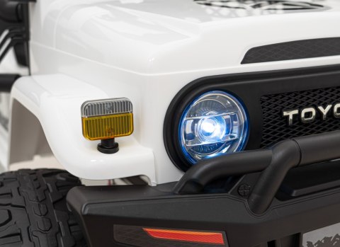 Toyota FJ Cruiser dla dzieci Biały + Pilot + Napęd 4x4 + Audio LED + EVA + Wolny Start Toyota FJ Cruiser dla dzieci Biały + Pilot + Napęd 4x4 + Audio LED + EVA + Wolny Start