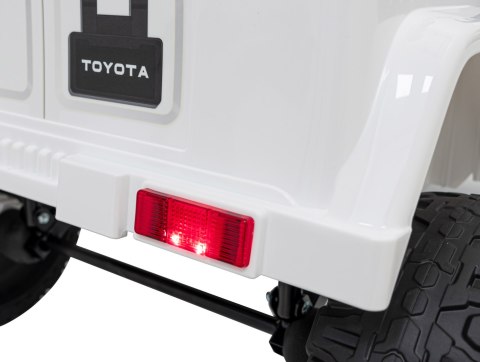 Toyota FJ Cruiser dla dzieci Biały + Pilot + Napęd 4x4 + Audio LED + EVA + Wolny Start Toyota FJ Cruiser dla dzieci Biały + Pilot + Napęd 4x4 + Audio LED + EVA + Wolny Start