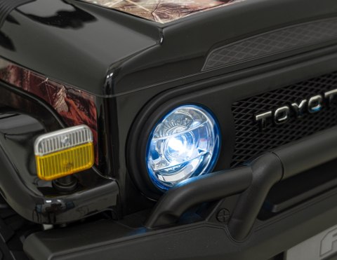 Toyota FJ Cruiser dla dzieci Czarny Liście + Pilot + Napęd 4x4 + Audio LED + EVA + Wolny Start Toyota FJ Cruiser dla dzieci Czarny Liście + Pilot + Napęd 4x4 + Audio LED + EVA + Wolny Start