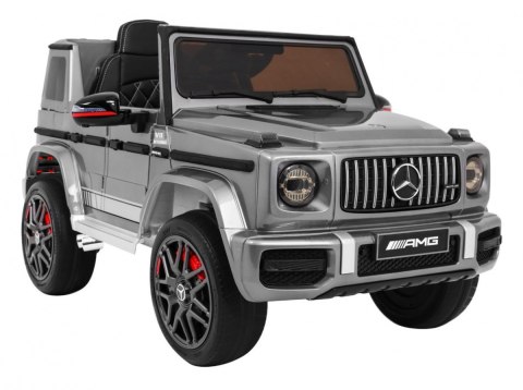 Mercedes AMG G63 dla dzieci Lakier Srebrny + Pilot + MP3 LED + Wolny Start + EVA + Pasy Mercedes AMG G63 dla dzieci Lakier Srebrny + Pilot + MP3 LED + Wolny Start + EVA + Pasy
