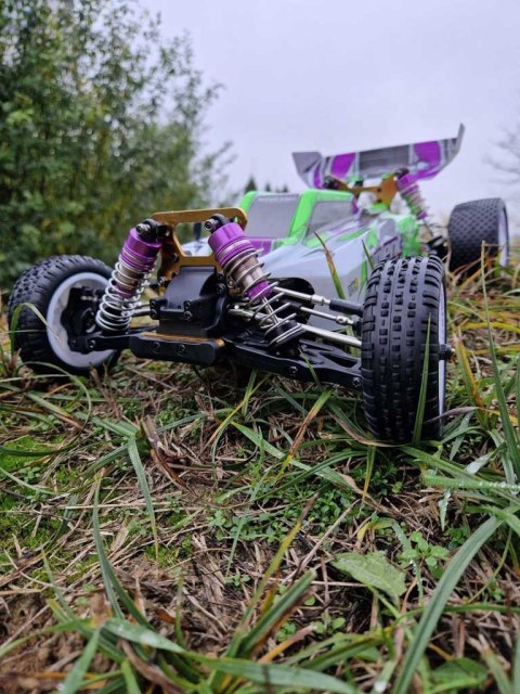 Samochód zdalnie sterowny terenowy wyczynowy WLToys 104002 1:10 4WD 2,4Ghz Kik Sp. z o. o. Sp. k. Samochód zdalnie sterowny terenowy wyczynowy WLToys 104002 1:10 4WD 2,4Ghz Kik Sp. z o. o. Sp. k.